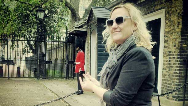 Shannon Fisher pretending to pinch a royal guard's bum