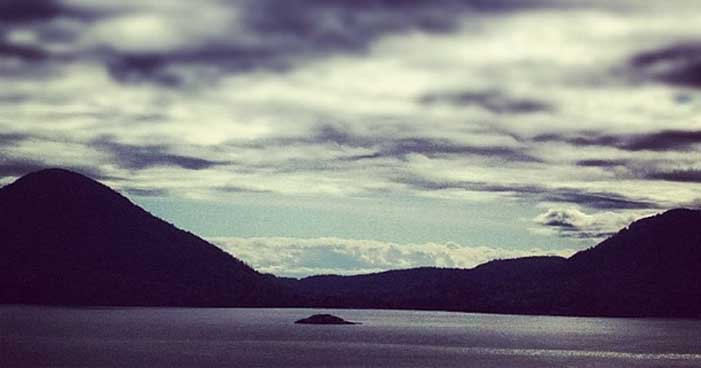 Grey skies and a single lonely island