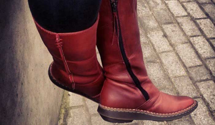 close up of Shannon Fisher's red boots