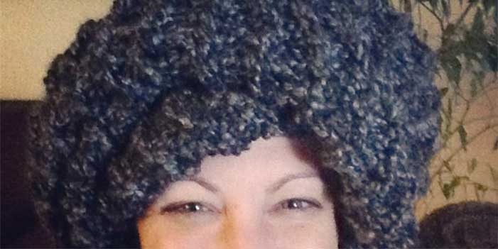 Shannon Fisher wearing a scarf on her head