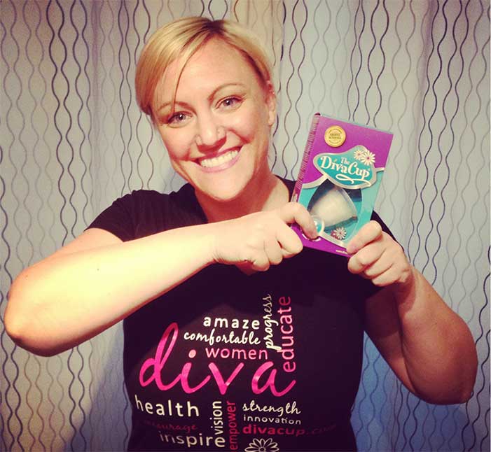Shannon holding a Diva Cup prize